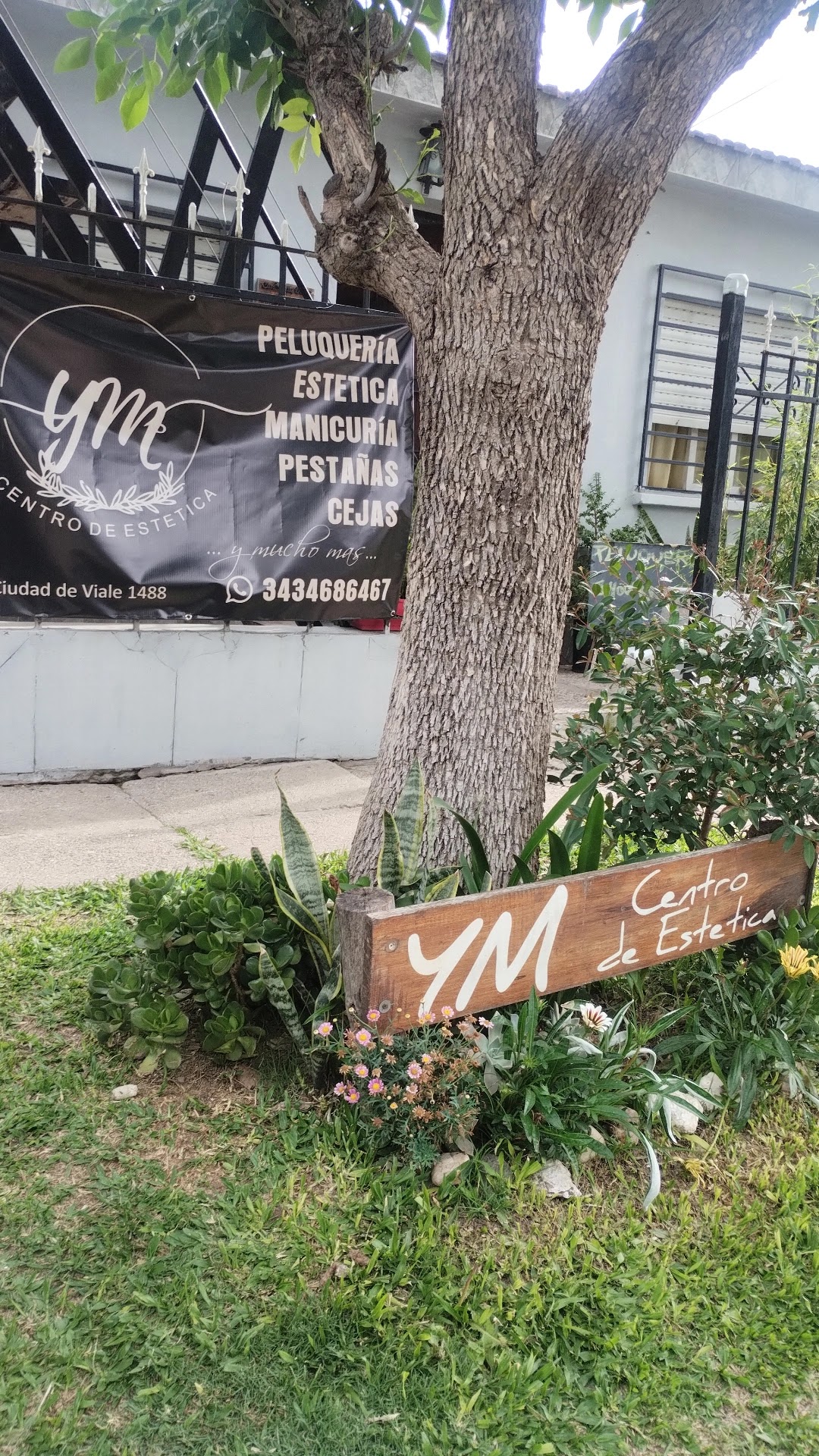 Fachada y cartel de YM Centro de Estética en Paraná
